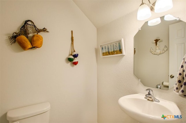 2502 Dante Ct, Harker Heights, TX 76548 - bathroom featuring a sink and vaulted ceiling