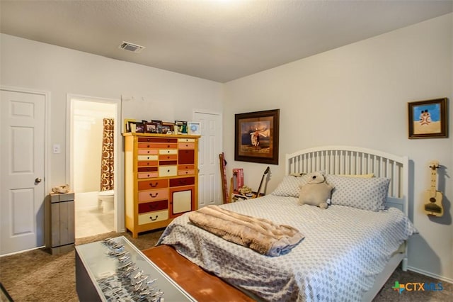 2502 Dante Ct, Harker Heights, TX 76548 - carpeted bedroom with baseboards and ensuite bath