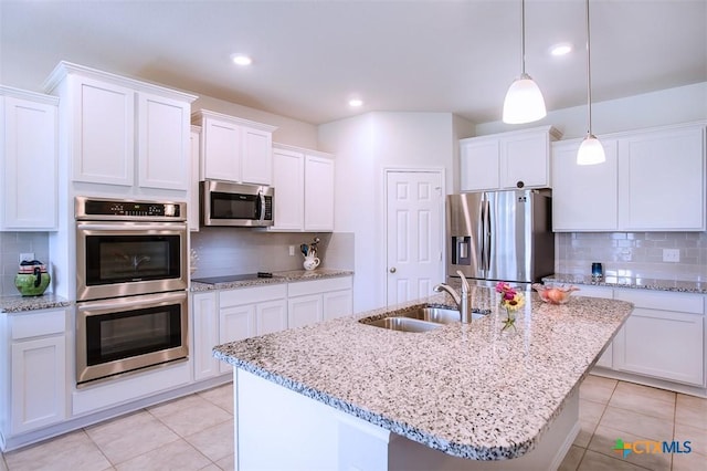 2502 Dante Ct, Harker Heights, TX 76548 - kitchen with stainless steel appliances, tasteful backsplash, light tile patterned floors, and recessed lighting