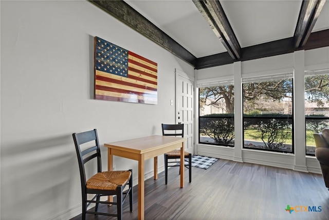 interior space featuring beamed ceiling