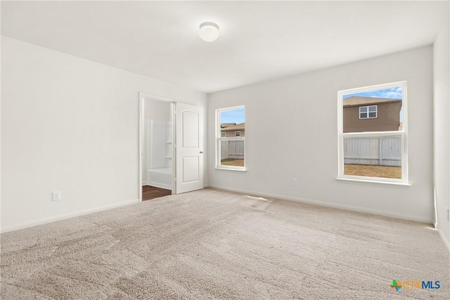 view of carpeted spare room