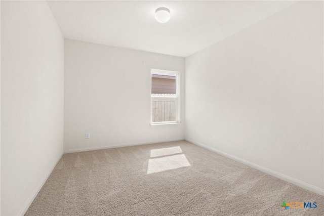 unfurnished room with carpet floors