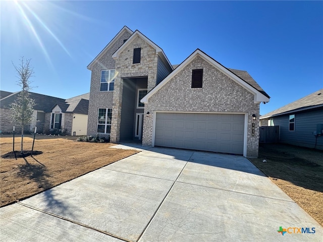 view of front of home featuring a garage