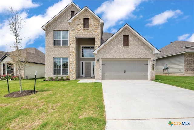 traditional-style home with a garage, brick siding, a front yard, and concrete driveway