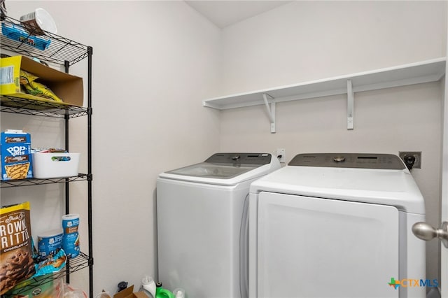 laundry room featuring washer and dryer