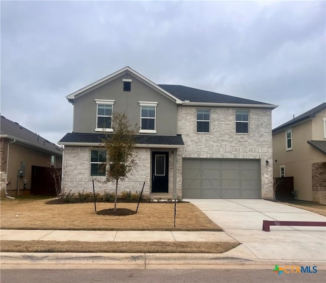 236 Torchwood Dr, Marble Falls, TX 78654 - view of front property featuring a garage