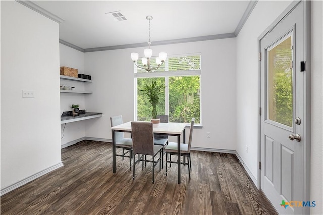 dining space featuring visible vents, crown molding, dark wood finished floors, baseboards, and an inviting chandelier