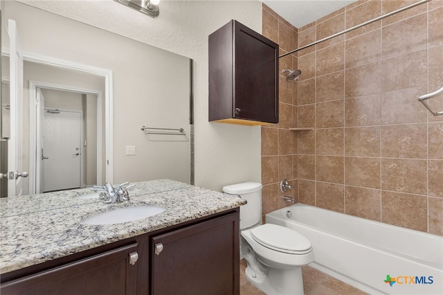 730 Stratus Path, New Braunfels, TX 78130 - bathroom featuring vanity, toilet, shower / bathtub combination, and tile patterned flooring