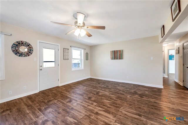 entrance foyer featuring ceiling fan and dark hardwood / wood-style flooring