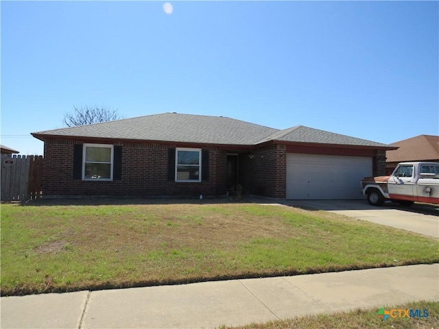 ranch-style home featuring an attached garage, a front lawn, concrete driveway, and brick siding