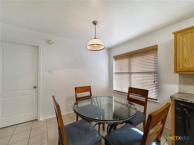 408 Rowdy Dr, Killeen, TX 76542 - dining area with light tile patterned flooring and a textured ceiling