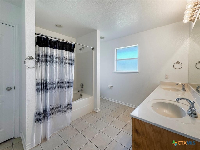 408 Rowdy Dr, Killeen, TX 76542 - full bath featuring tile patterned floors, a textured ceiling, double vanity, and shower / tub combo