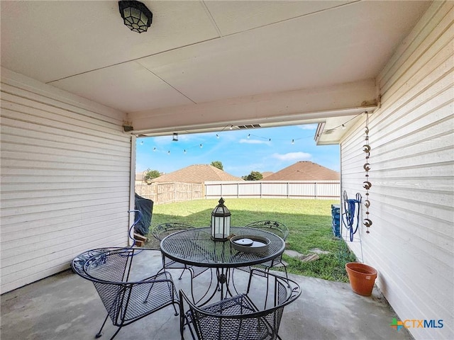 408 Rowdy Dr, Killeen, TX 76542 - fenced backyard featuring a patio and outdoor dining area
