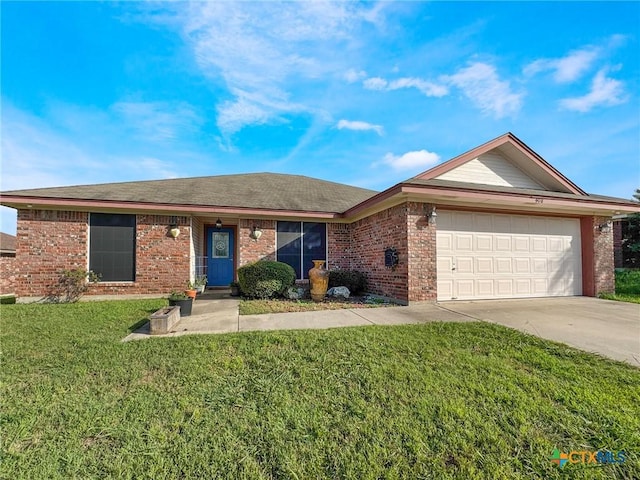408 Rowdy Dr, Killeen, TX 76542 - ranch-style house featuring brick siding, driveway, a front lawn, and an attached garage