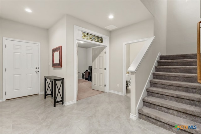135 Mary Max Cir, San Marcos, TX 78666 - entryway with stairway, recessed lighting, light tile patterned floors, and baseboards