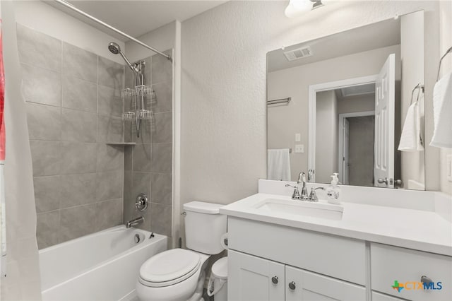 135 Mary Max Cir, San Marcos, TX 78666 - bathroom featuring toilet, shower / bath combo with shower curtain, and vanity