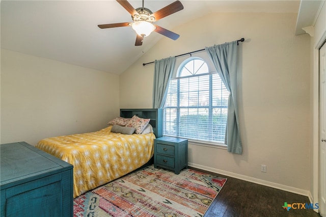 bedroom featuring ceiling fan, wood-type flooring, and lofted ceiling