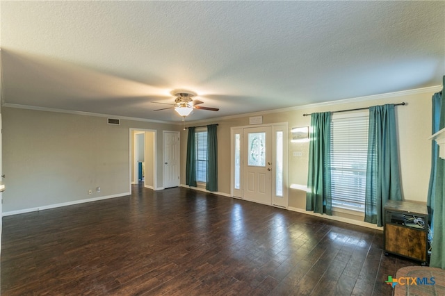 foyer entrance featuring visible vents, ceiling fan, ornamental molding, wood finished floors, and a textured ceiling