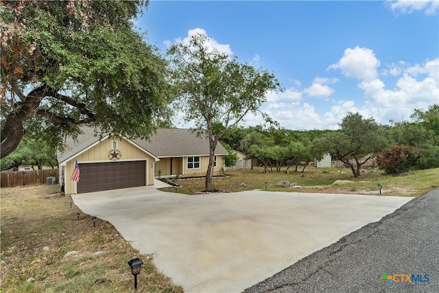1139 Persimmon Pass, Fischer, TX 78623 - view of front of home with concrete driveway and a garage