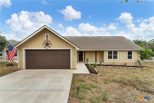 1139 Persimmon Pass, Fischer, TX 78623 - single story home with roof with shingles, an attached garage, concrete driveway, and board and batten siding