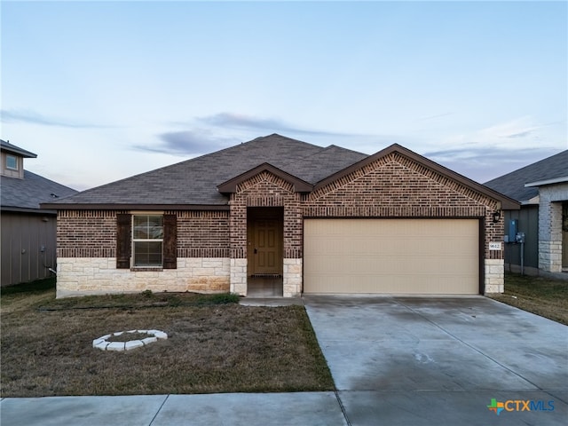 view of front of property with a garage