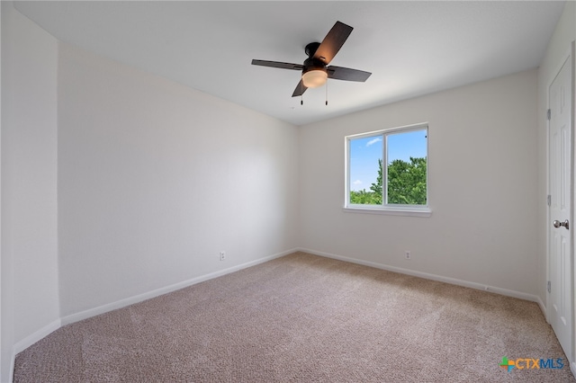 907 Pecos Cv, Leander, TX 78641 - carpeted empty room with ceiling fan and baseboards