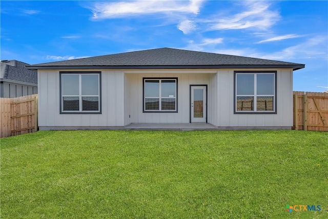 2322 Healy Dr, Temple, TX 76502 - rear view of property with a fenced backyard, roof with shingles, and a patio area