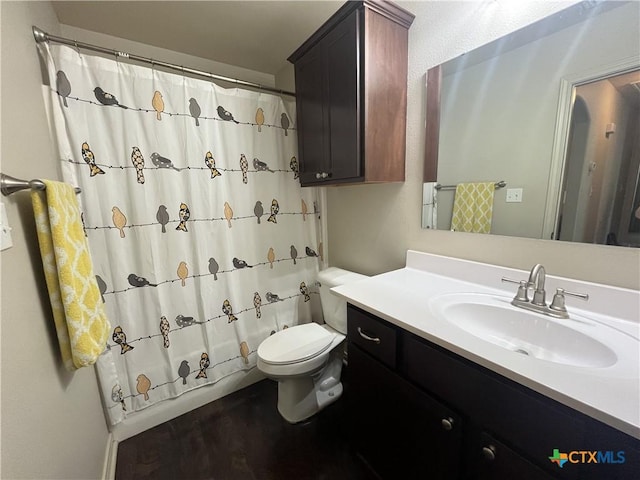 906 2nd St, Cuero, TX 77954 - bathroom featuring toilet and vanity