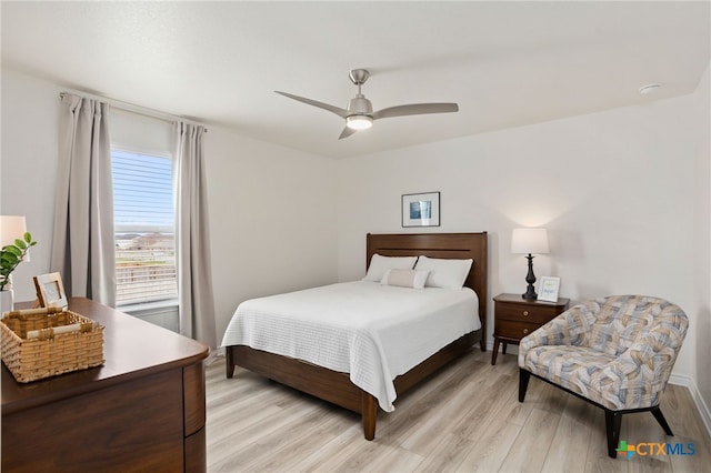 507 Dakota Crk, New Braunfels, TX 78130 - bedroom with light wood-style flooring and ceiling fan