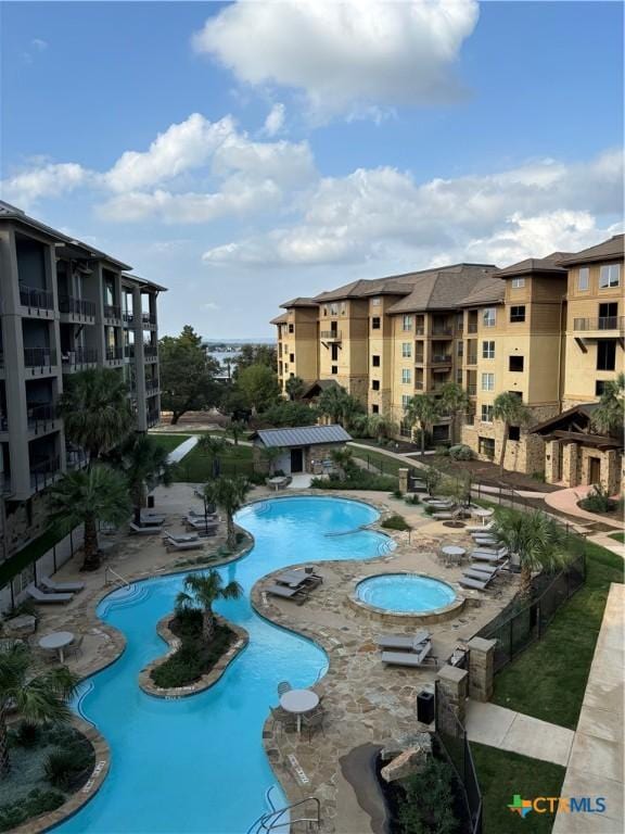 view of pool featuring a patio area