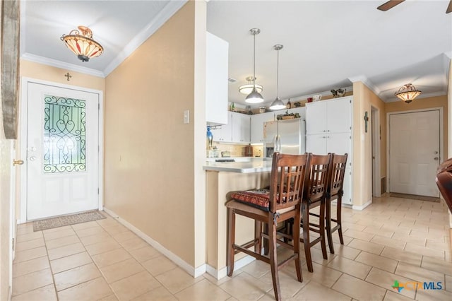 3735 Smoke Signal Rd, Belton, TX 76513 - entrance foyer featuring ornamental molding, light tile patterned floors, and a ceiling fan