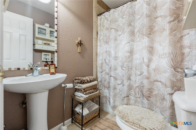 3735 Smoke Signal Rd, Belton, TX 76513 - full bathroom featuring toilet and a shower with shower curtain