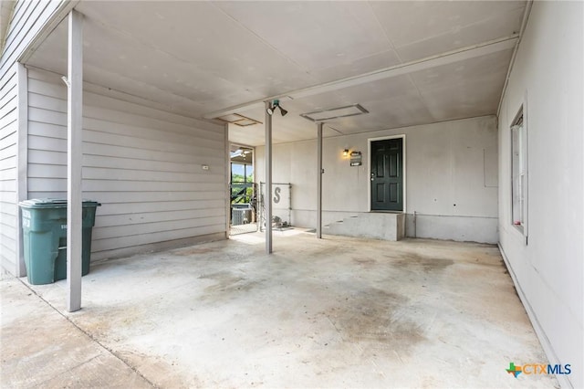 3735 Smoke Signal Rd, Belton, TX 76513 - garage featuring an attached carport