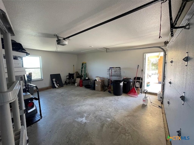 garage featuring a garage door opener