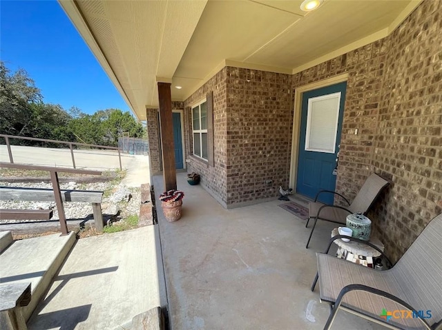 view of patio with fence