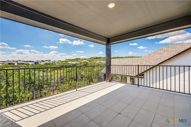 view of patio / terrace with a balcony