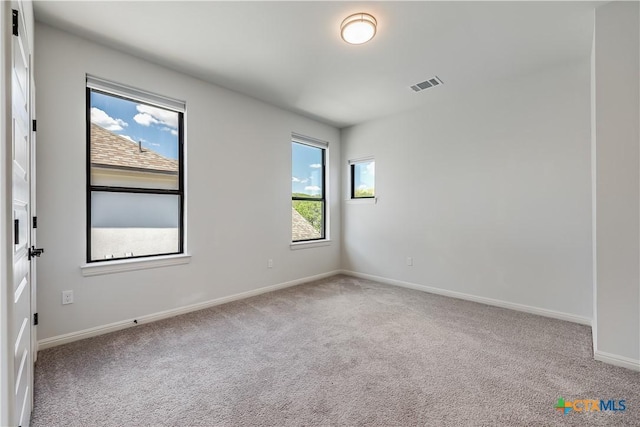 view of carpeted spare room