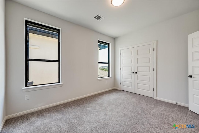 view of carpeted spare room