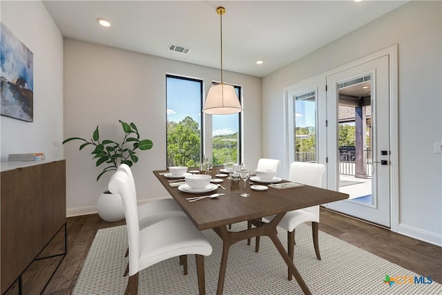 dining room featuring dark hardwood / wood-style floors