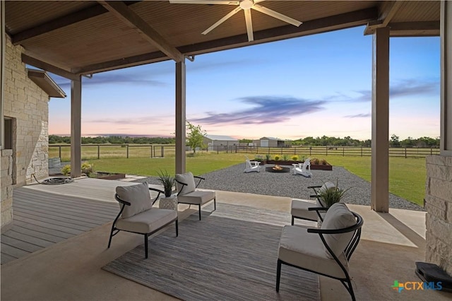 215 Mesa Vista Dr, Leander, TX 78641 - deck with a fire pit, a fenced backyard, ceiling fan, and a patio
