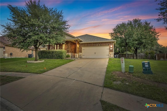5507 Sulfur Spring Dr, Killeen, TX 76542 - view of front facade with concrete driveway, an attached garage, brick siding, and a porch