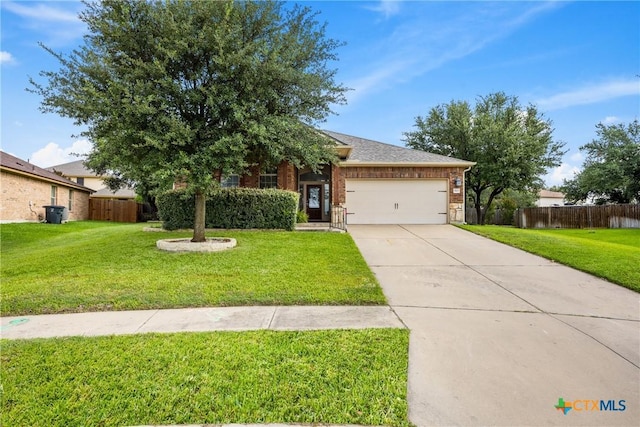 5507 Sulfur Spring Dr, Killeen, TX 76542 - view of property hidden behind natural elements with brick siding, a garage, and concrete driveway