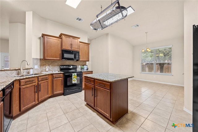 5507 Sulfur Spring Dr, Killeen, TX 76542 - kitchen featuring black appliances, a chandelier, light tile patterned flooring, decorative backsplash, and brown cabinetry