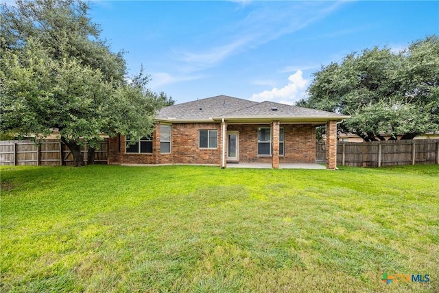 5507 Sulfur Spring Dr, Killeen, TX 76542 - back of house featuring a patio area, brick siding, and roof with shingles