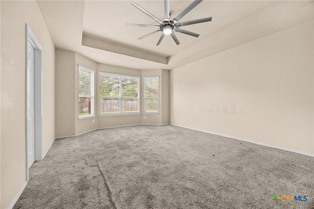 5507 Sulfur Spring Dr, Killeen, TX 76542 - spare room with carpet flooring, ceiling fan, and a tray ceiling