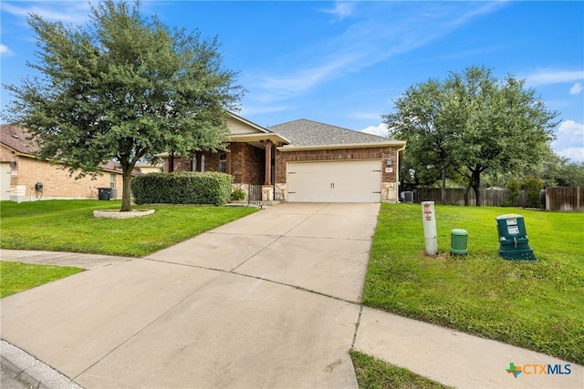 5507 Sulfur Spring Dr, Killeen, TX 76542 - view of front of property with a garage, brick siding, and driveway