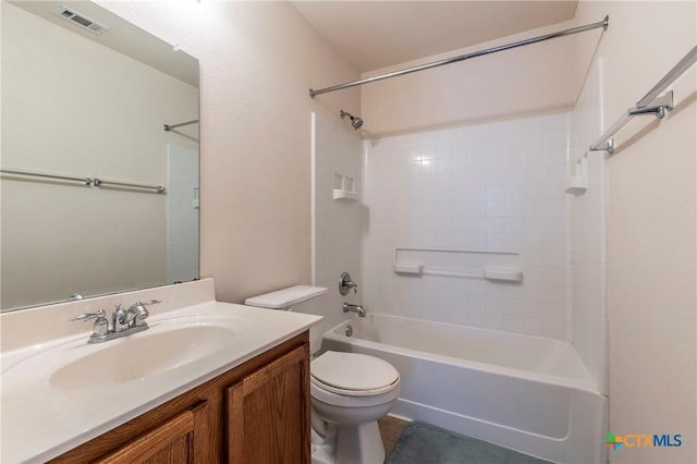 full bathroom featuring vanity, tile patterned flooring,  shower combination, and toilet