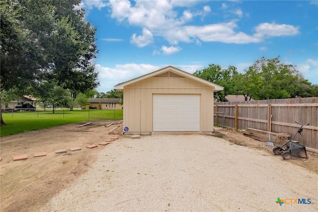 305 Berwick St, Victoria, TX 77904 - detached garage featuring dirt driveway