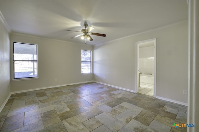 empty room featuring crown molding and ceiling fan