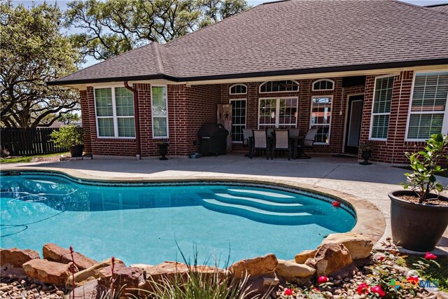 207 C L Duckett Dr, Cuero, TX 77954 - view of pool with fence, a patio, and area for grilling